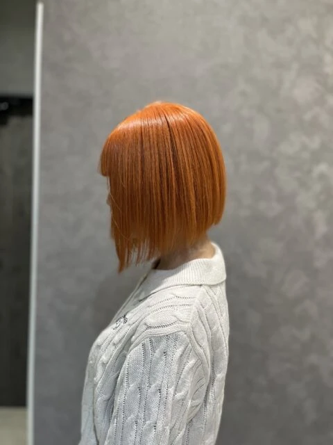ビビットオレンジで映える髪